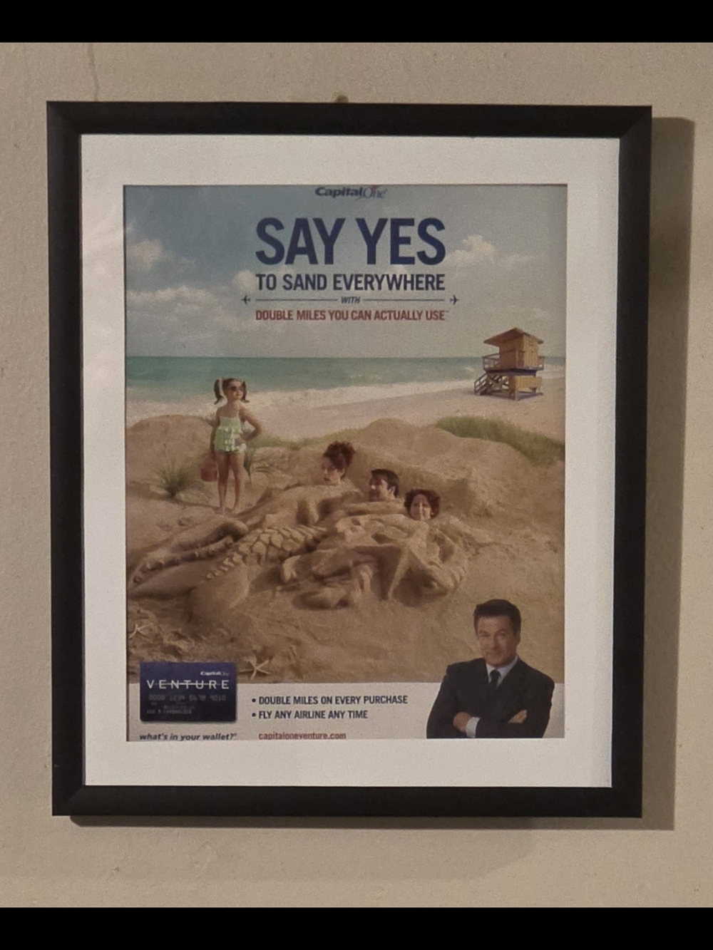 This item is a framed Capital One Venture Ad Print With Alec Baldwin